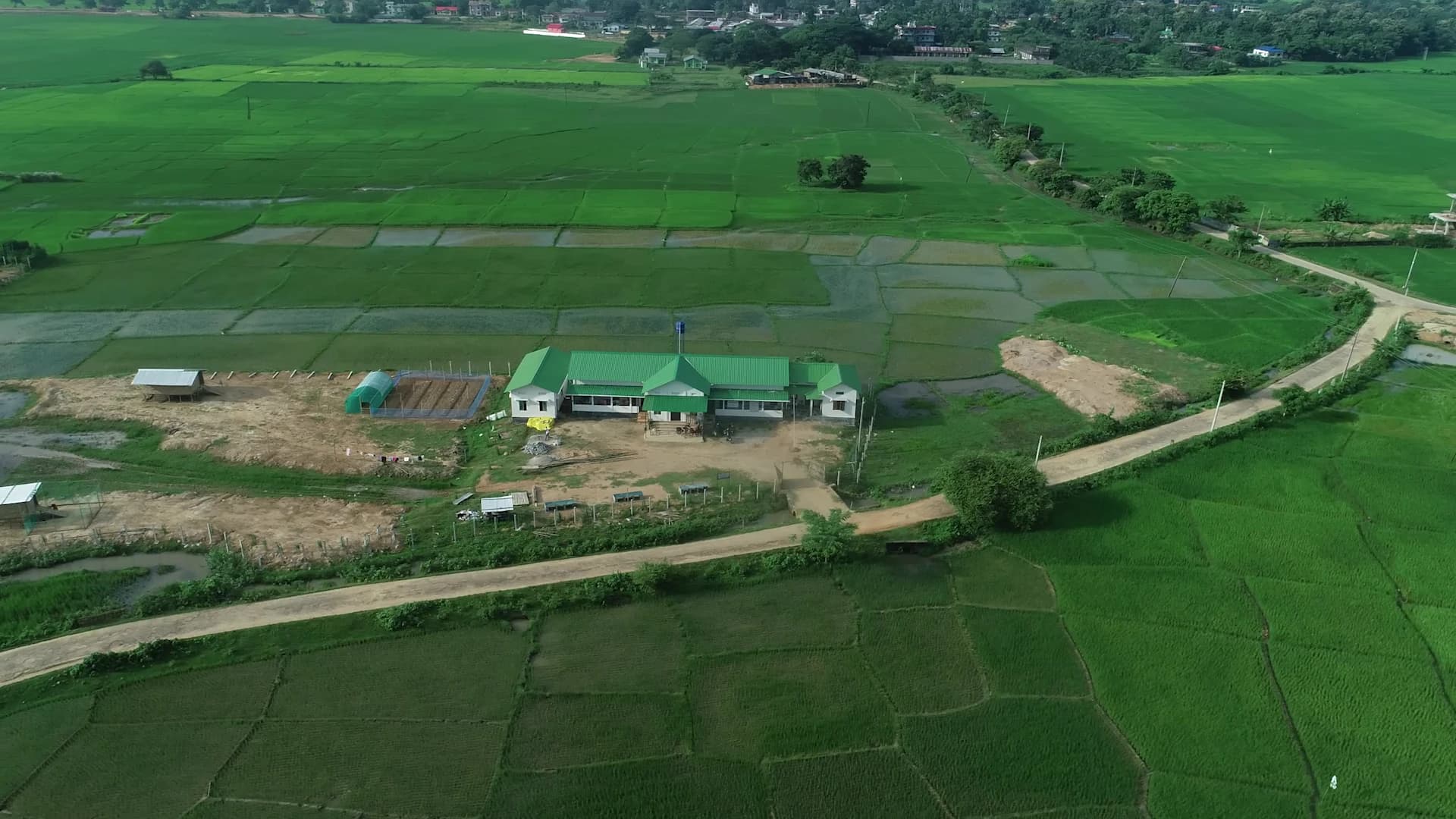 Aerial view of Chitrang Training Centre among paddy fields in Goalpara, Assam
